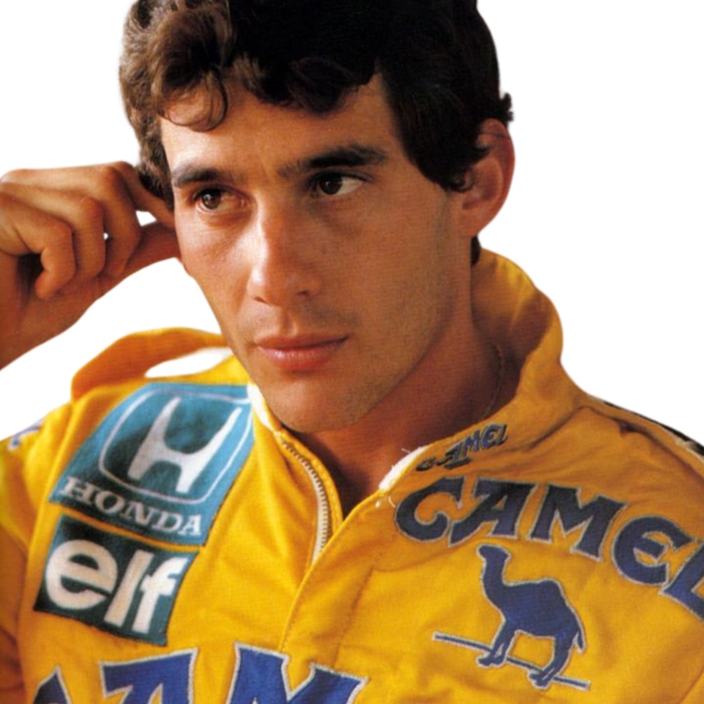 Close-up shot of the 1987 F1 racing suit worn by Ayrton Senna, highlighting premium stitching, fabric texture, and colorful sponsor logos.
