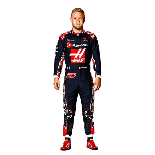 Front view of Kevin Magnussen's 2023 special edition F1 racing suit for the Austin Grand Prix, featuring a navy blue base with bold red and white accents inspired by the American flag. The suit showcases a prominent star design on the leg and subtle stripes in the background, crafted from high-performance, fire-resistant Nomex fabric for safety and comfort.