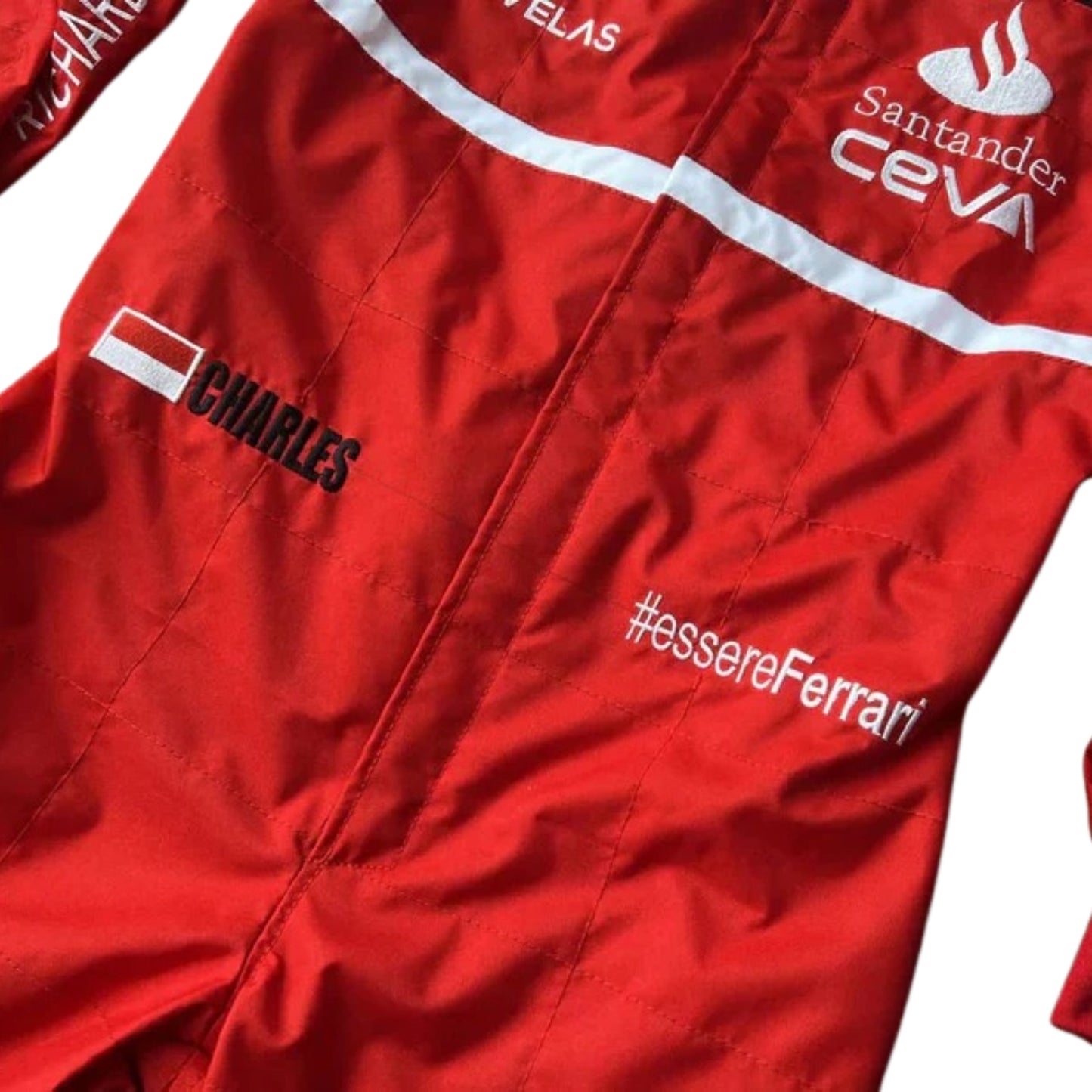 Close-up of the suit's fine stitching and detailed sponsor logos, highlighting the craftsmanship and quality of the 2022 racing gear.