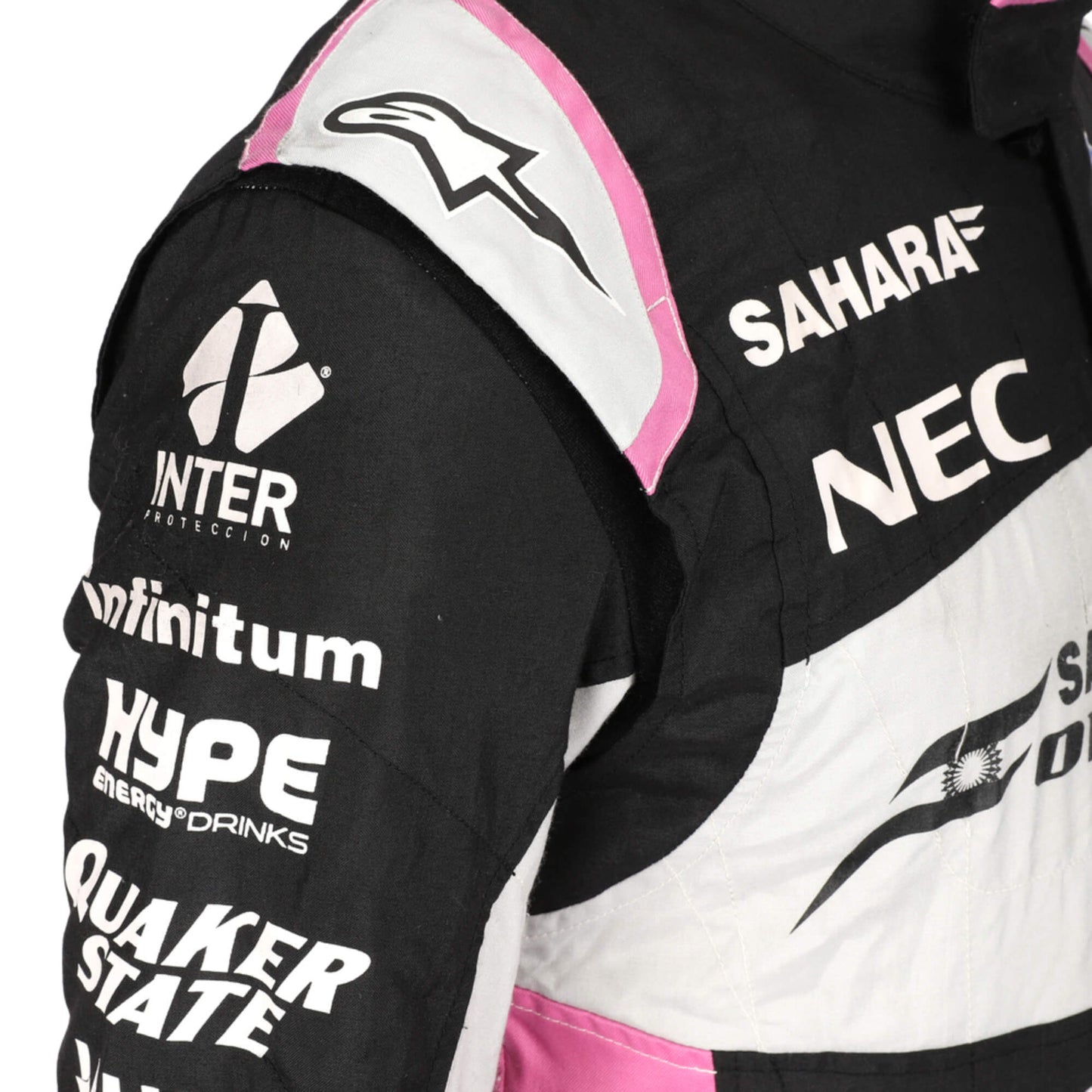Detailed view of the sleeve on Esteban Ocon’s 2017 racing suit, featuring sponsor patches and precise tailoring