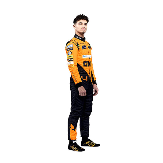 Lando Norris standing confidently in his 2024 Formula 1 racing suit, front view showcasing a vibrant papaya orange base with contrasting black panels and subtle detailing along the chest and arms.