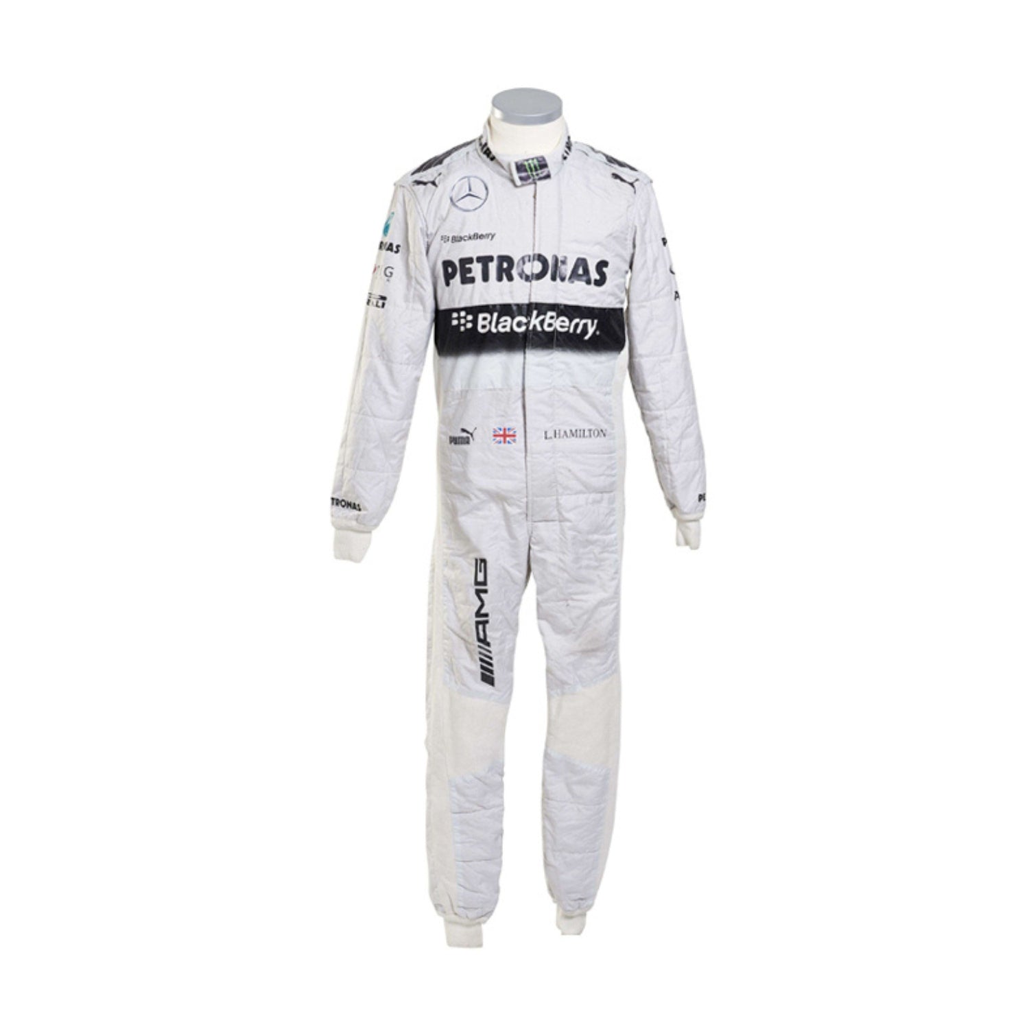 Front view of Lewis Hamilton’s 2014 F1 racing suit in white and teal colors, worn during his championship-winning season showcasing sleek race-ready design.