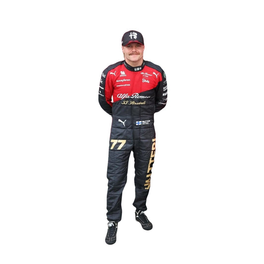 Valtteri Bottas' 2023 Italian GP F1 racing suit front view featuring a matte black base with vivid green accents and bold white sponsor branding, worn during the Monza race weekend.