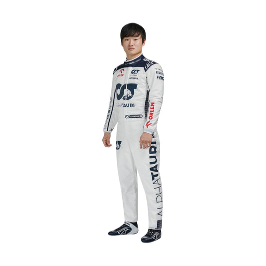 Yuki Tsunoda’s 2023 F1 racing suit front view featuring a white base with navy blue accents on the shoulders and sides, complemented by red sponsor logos, showcasing a sleek and modern design.